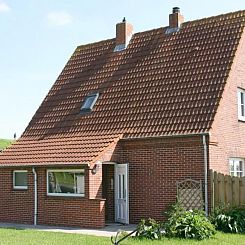 Vakantiehuis mit Wintergarten und Garten am Deich