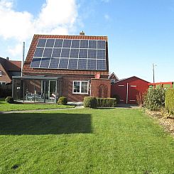 Vakantiehuis mit Wintergarten und Garten am Deich
