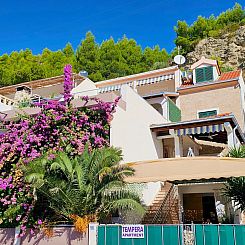 Appartement mit überdachter Terrasse am Strand mit Meerblic