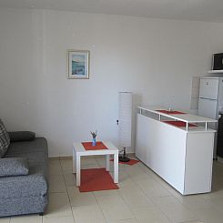 Vakantiehuis mit überdachter Terrasse und Meerblick