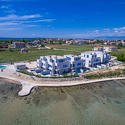 Vakantiehuis Strandvilla Miri Rose mit beheizbarem Pool