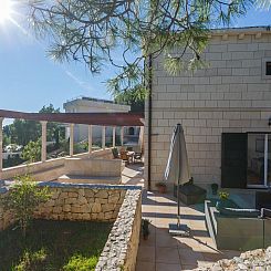 Vakantiehuis Ferienvilla "Osibova" mit Blick auf das Wasser