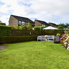Een comfortabel vier persoons vakantiehuis met ruime tuin,