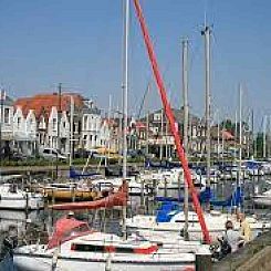 4-persoons vakantiehuis met tuin en balkon aan het