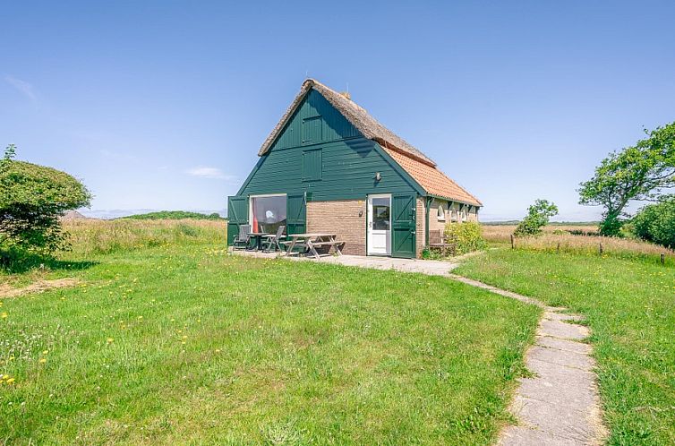Sheepfold De Boet in De Koog, Texel at sunset, surrounded by lush nature on the Wadden Islands.