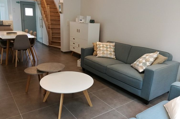 Gezellige zithoek in THE FRONT DOOR N12, vakantiehuis in Ieper, West-Vlaanderen.