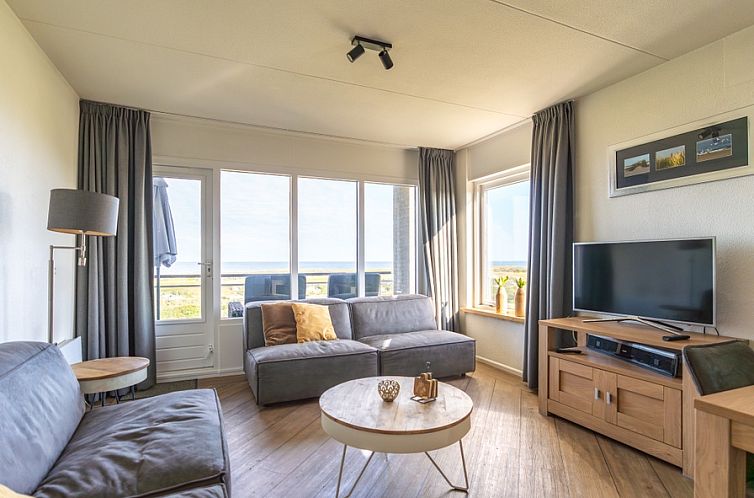 Cozy living room in Apartment Juliana 118 Zeezicht, De Koog, Texel with panoramic sea views.