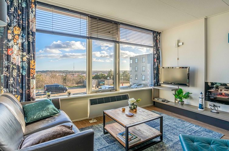 Gezellige woonkamer in Appartement Juliana 126 Eilandzicht, De Koog, Texel met prachtig uitzicht op de natuur van de Waddeneilanden.