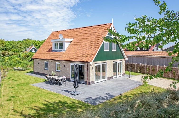 Dennenbries vacation home in De Koog, Texel with spacious garden and terrace for relaxation in nature.