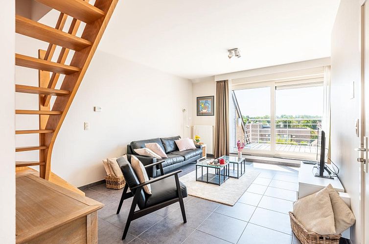 Lysa viertes Ferienhaus in Koksijde, Westflandern mit modernem Wohnzimmer und Terrassenblick.