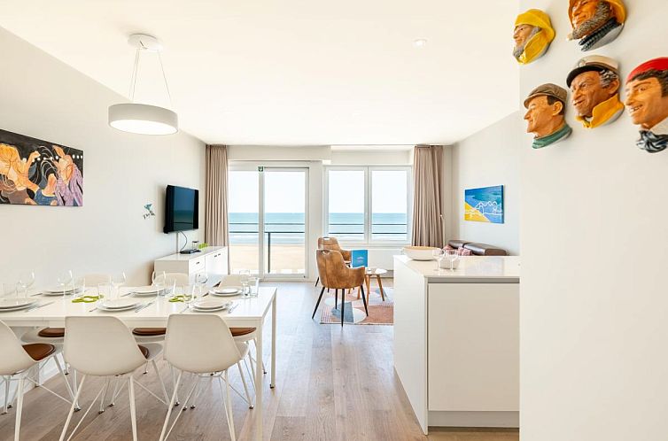 Gemuetliches Wohnzimmer des Ferienhauses LaVue premier in Koksijde, Westflandern, mit schoenem Meerblick von der Terrasse.