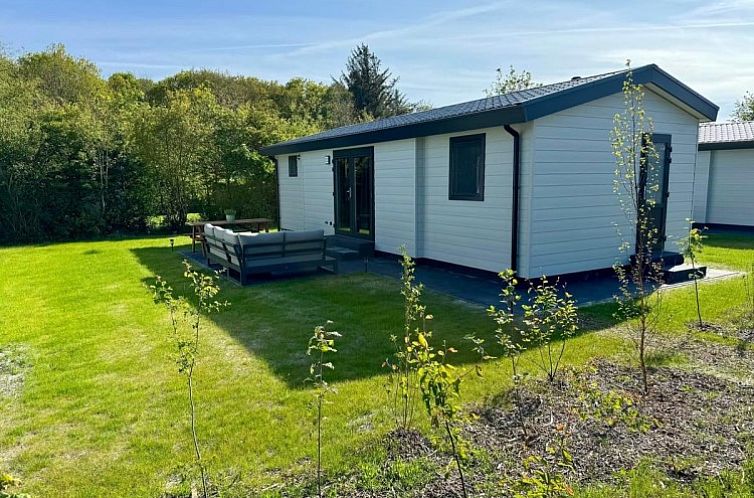 Chalet Zeebries in De Dennen, Texel surrounded by green nature, ideal vacation home on the Wadden Islands.