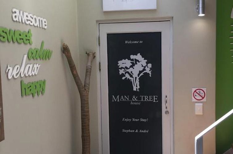 Man And Tree House