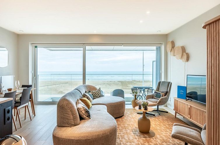 Ferrel erstes Ferienhaus in Sint-Idesbald, Westflandern mit einem geraeumigen Wohnzimmer und Meerblick von der Terrasse.