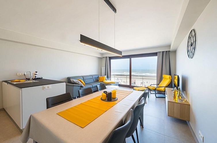 Innenansicht des Ferienhauses "Verdiende Rust - 0201" in Middelkerke, Westflandern, mit moderner Einrichtung und Meerblick.