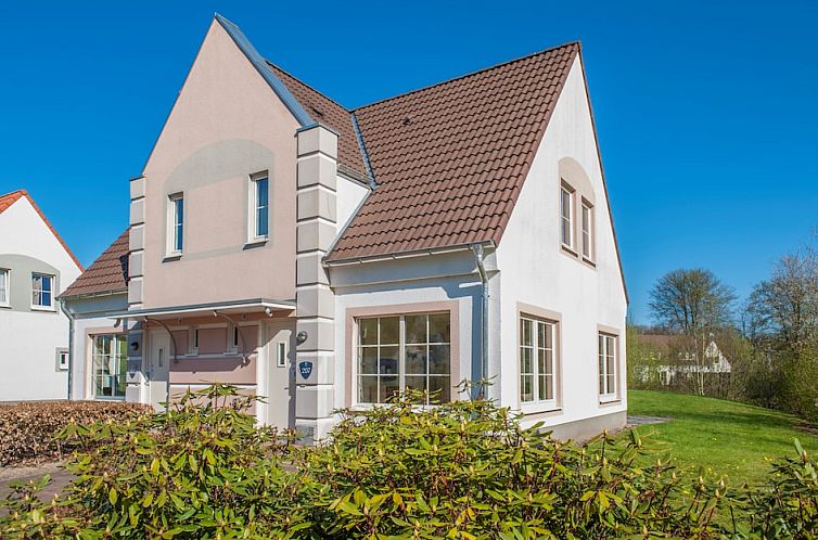 Vacation home BBL4 in Bad Bentheim, Germany, surrounded by greenery and rustic charm, ideal for a relaxing stay.