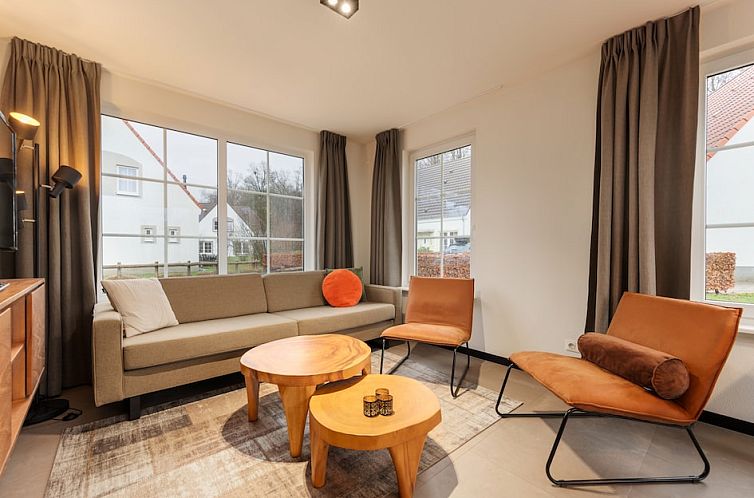 Cozy interior of BB5 Comfort vacation home in Bad Bentheim, Lower Saxony, with contemporary design and luxury amenities.