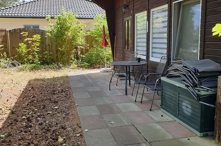 Appartement Holz-Bungalow mit Terrasse