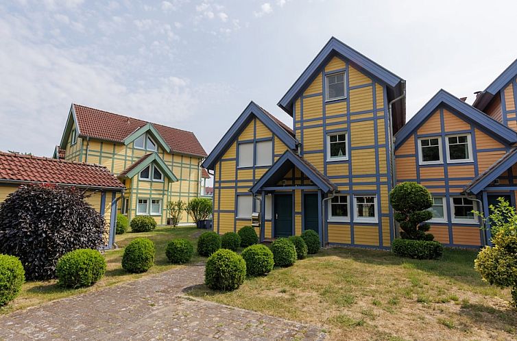 Vacation home F+ Seagull in Rheinsberg, Berlin, offers picturesque accommodation with a lively exterior and manicured garden.