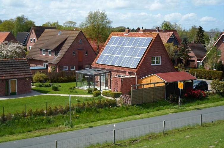 Vakantiehuis mit Wintergarten und Garten am Deich