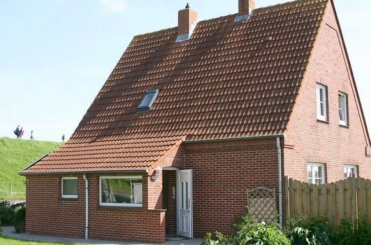 Vakantiehuis mit Wintergarten und Garten am Deich