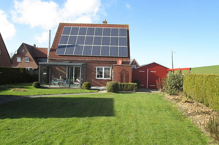 Vakantiehuis mit Wintergarten und Garten am Deich