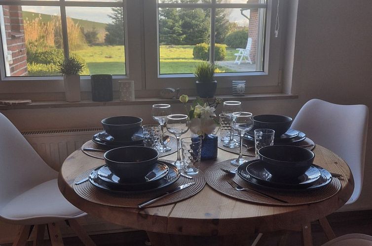 Vakantiehuis mit Wintergarten und Garten am Deich