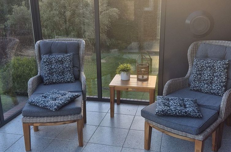 Vakantiehuis mit Wintergarten und Garten am Deich