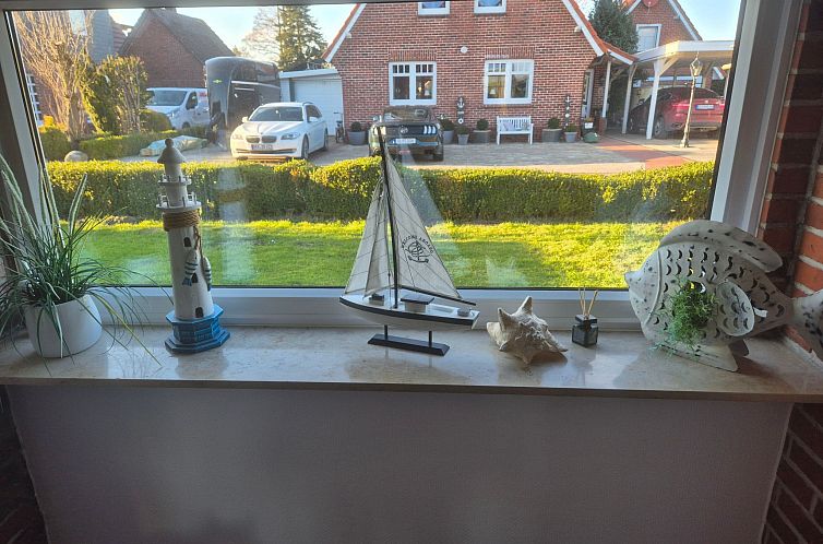 Vakantiehuis mit Wintergarten und Garten am Deich