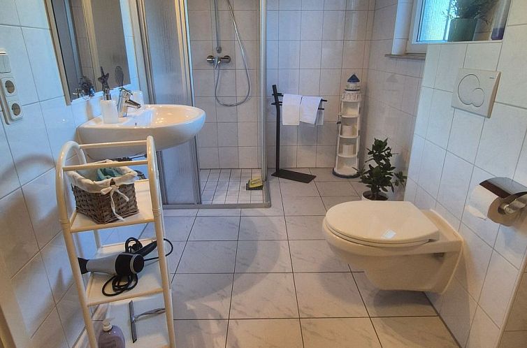 Vakantiehuis mit Wintergarten und Garten am Deich