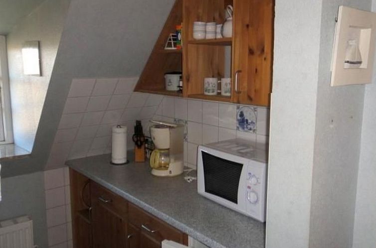 Appartement Wohnung in einem reetgedeckten Friesenhaus aus d