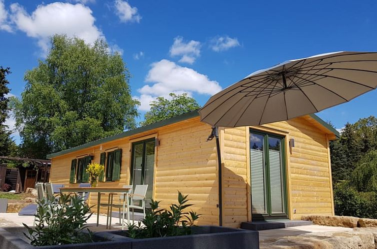 Vacation home in Mucke, Hesse offers a beautiful terrace for relaxation. Experience nature and comfort in this German vacation home.