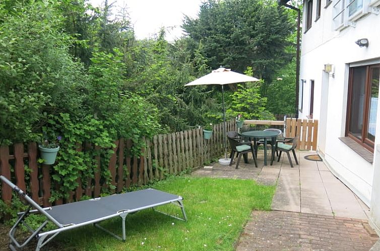 Enjoy the green surroundings at the Holiday Home in Edertal, Hesse, with an inviting terrace.