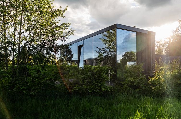 Modern vacation home in Schleiden, Eifel, surrounded by greenery with beautiful views of the natural surroundings.