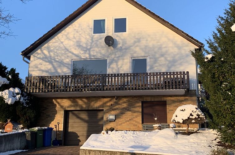 Cozy residence Haus Steinblick in Winterberg, Germany, with beautiful winter views from the balcony.