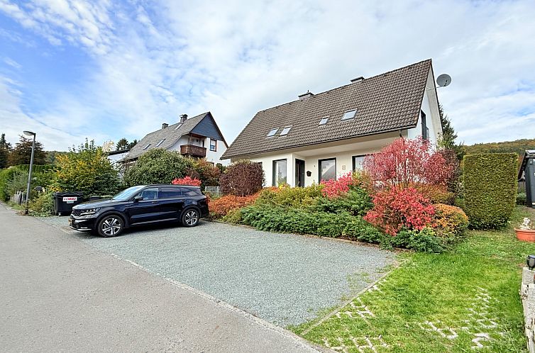 Vacation home NWD013 in Winterberg, Sauerland, Germany, surrounded by beautiful autumn colors.