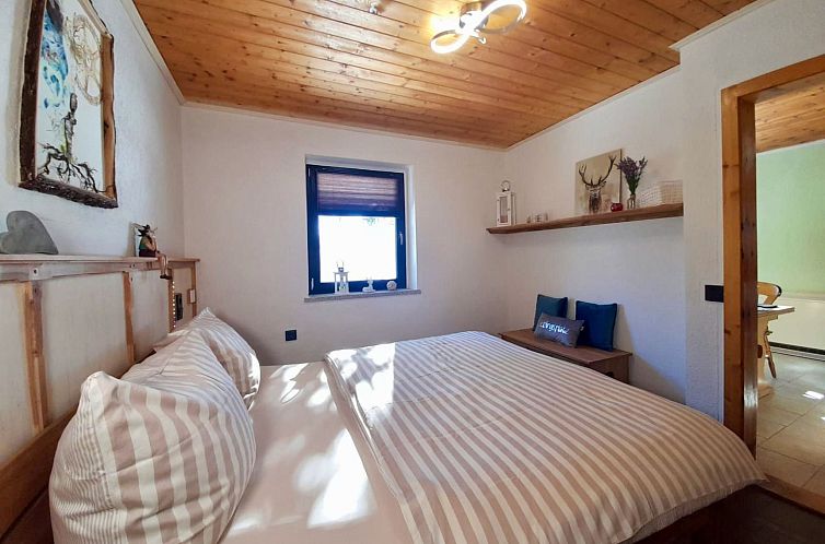 Vakantiehuis Am Wald gelegenes Ferienhaus "Wolf" mit Kamin