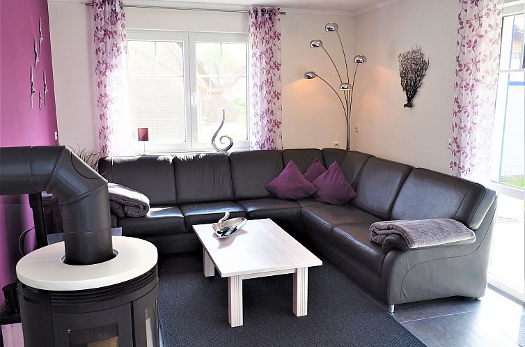 Vakantiehuis Traumhafte Reetdach-Doppelhaushälfte mit Garte