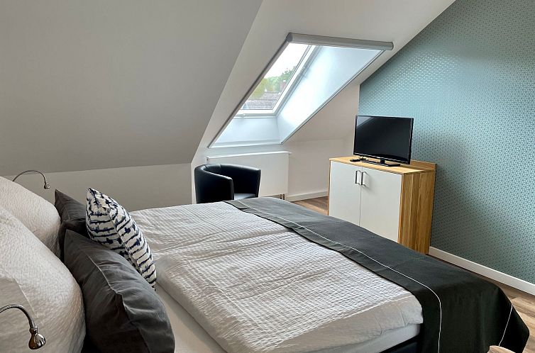Appartement mit Balkon