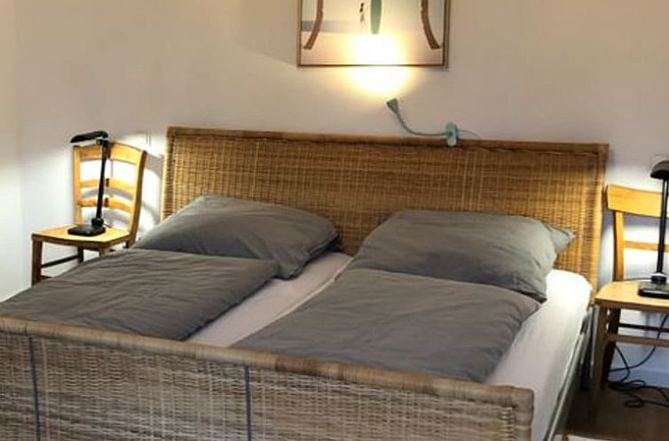 Gemuetlicher Schlafplatz im Holiday Home in Waizenbach, Bayern. Entspanntes Ambiente in diesem charmanten Ferienhaus in Deutschland.