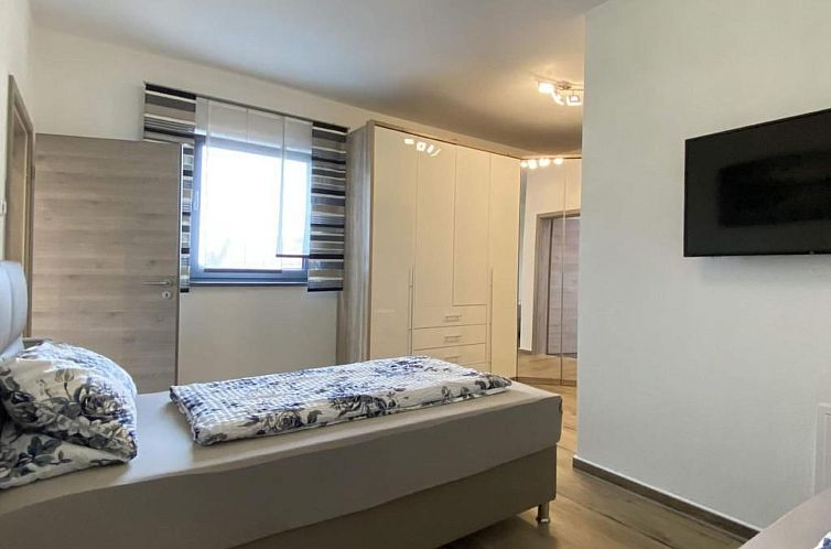 Appartement in Heselbach mit Grill, Whirlpool und Garten