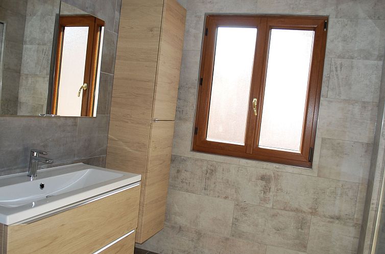 Vakantiehuis mit Gemeinschaftsgarten und Grill