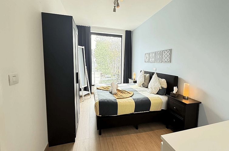 Spacious 3BR 25 BA Near Diamond District by OneLuxStay