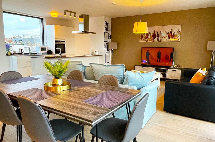 Modern 2BR Penthouse Near Diamond District by OneLuxStay