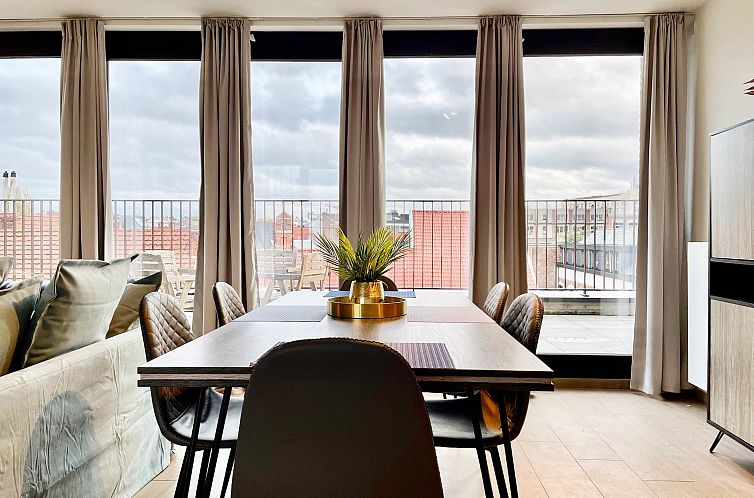 Modern 2BR Penthouse Near Diamond District by OneLuxStay