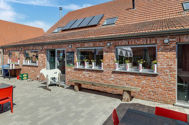 IN DE WOLLEKJES  “slapen bij of tussen de schapen”