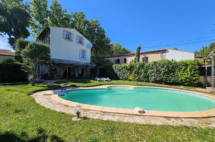Enjoy the pool and serene garden at Les Chataignes, a vacation home in Canet, Roussillon.