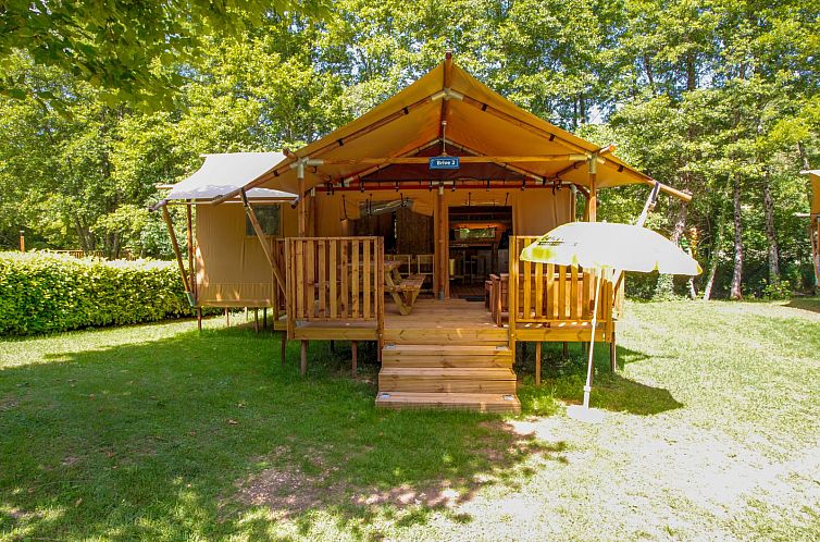 Relax in Lodgetent Brive in Souillac, Midi-Pyrenees, a cozy cottage with veranda, surrounded by nature.