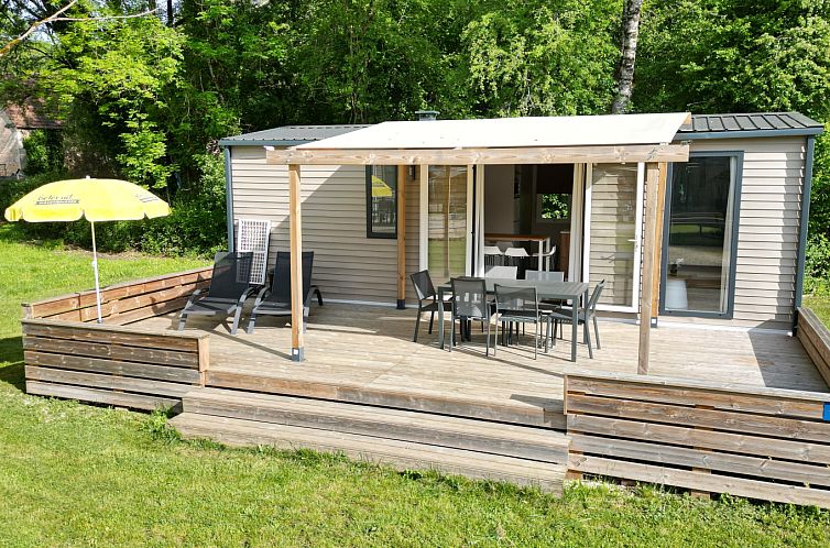 Relax on the veranda of Mobilhome Toulouse in Souillac, Midi/Pyrenees, France, an ideal place for a restful vacation.