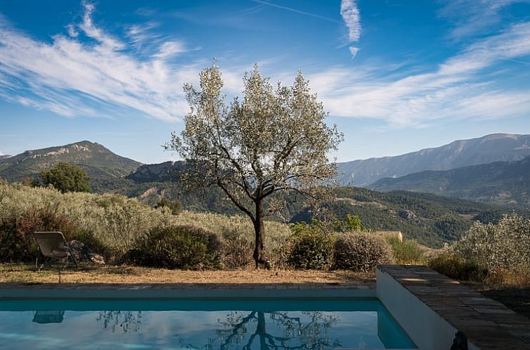 Enjoy the serene nature surrounding Cottage in Buis-les-Baronnies, located in Rhone-Alpes, France, with beautiful mountain views.